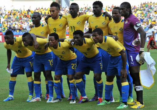 Gabon-12-PUMA-home-kit-yellow-blue-blue-line-up.jpg
