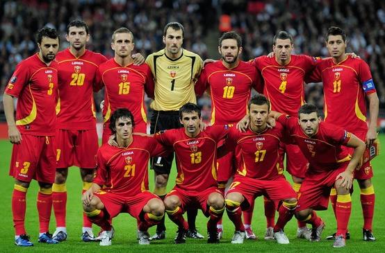 Montenegro-10-11-LEGEA-home-kit-red-red-red-line-up.JPG